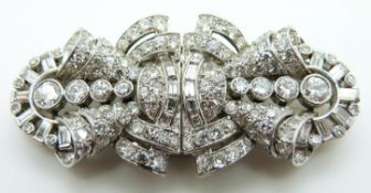 A c1930s platinum metamorphic brooch / pair of hair clips,