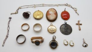 A silver ring set with garnets, agate pendant, silver St Christopher pendant,