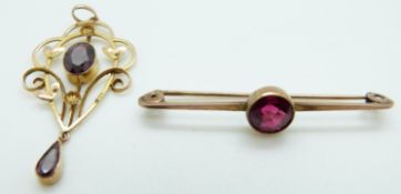 A 9ct gold pendant set with garnets and a 9ct gold brooch set with a synthetic ruby, 4.