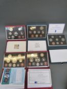 Five Royal Mint deluxe proof coin sets with certificates 1989 to 1998s