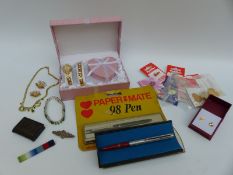 A collection of costume jewellery including yellow metal earrings, silver brooch,