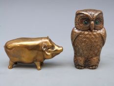 Two novelty vesta cases, one a pig,