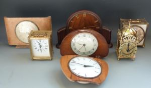 Four c1930 - 1950's mantel clocks including Smiths and Metamec together with three brass cased