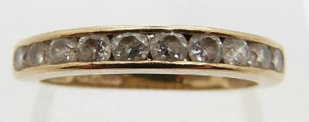 A 9ct gold half eternity ring set with 10 cubic zirconia, size M, 1.