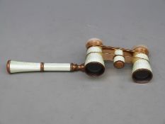 A pair of folding opera glasses in pale green guilloché enamel by Busch,