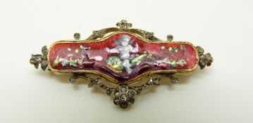 A Victorian brooch set with red guilloché enamel,