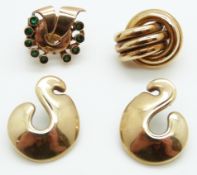 A pair of 9ct gold earrings, a 9ct gold earring set with emeralds and a yellow metal earring, 13.
