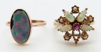 A 9ct gold ring set with an opal doublet and a 9ct gold ring set with a ruby, opals and seed pearls,