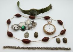 A yellow metal Chinese necklace with carved links in the form of Chinese figures,