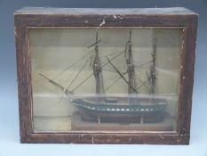 A possibly prisoner of war model of a Napoleonic era ship with rigging and bone or similar fittings,