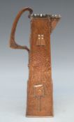 An Art Nouveau / Arts and Crafts hammered copper jug of square tapering form by Hayle,