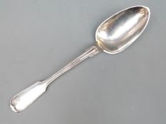 A white metal spoon marked JWERSEN 0750 silver, length 26.