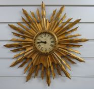 Newgate London quartz sunburst wall clock with distressed look Roman dial,