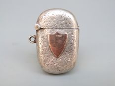 Victorian hallmarked silver and gold vesta case, Birmingham 1899, maker's mark JG, 42mm tall,