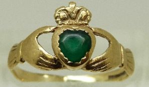 A 9ct gold Claddagh ring set with green paste, size M, 1.