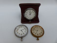 A cased 8 day Swiss travel clock, Wm Greenwood & Sons,