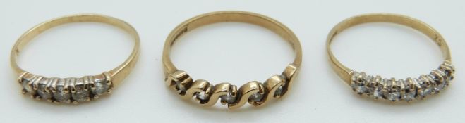 Three 9ct gold rings set with cubic zirconia, size O, 1.4g, L, 1.2g, L, 0.