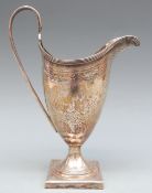 Georgian hallmarked silver helmet shaped pedestal cream jug with bright cut decoration and vacant