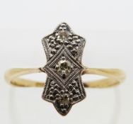 An 18ct gold ring set with diamonds in a platinum setting, size L/M, 2.