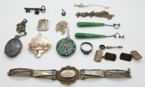A collection of silver and white metal jewellery including cufflinks, filigree bracelet, pendants,