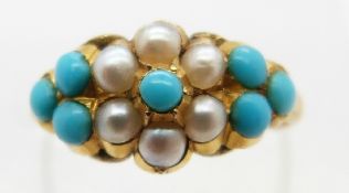 A Victorian ring set with seed pearls and turquoise, glass compartment verso, size K, 2.