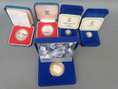 A collection of silver coinage including crowns,