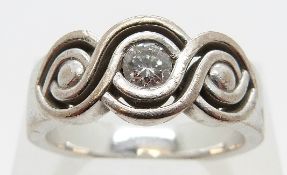 An 18ct white gold ring set with a round brilliant cut diamond measuring approx 0.25ct, size S, 13.