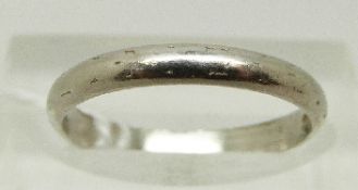 A platinum ring/ wedding band, size K, 2.
