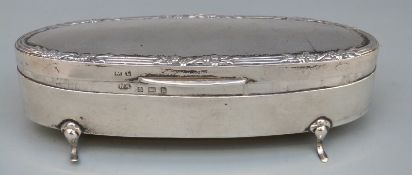 Edward VII hallmarked silver dressing table ring box of oval form with slots for eight rings,