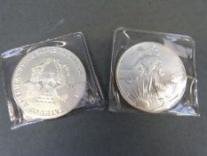 Two walking Liberty USA silver dollar coins 1987 and 1993