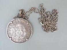 1740 8 Reale (piece of 8) in mount 'Treasure from Hollandis sunk 1743',