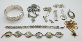 A collection of silver jewellery including a bangle, Chester 1957, boulder opal pendant,