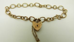 A 9ct gold bracelet with heart padlock clasp, 9.