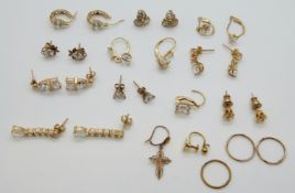 Five pairs of 14k gold earrings set with cubic zirconia, 12.