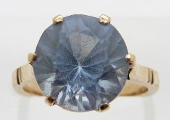 A 9ct gold ring set with a round cut zircon, size J, 3.