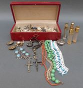 A collection of costume jewellery including coral necklace, glass beads,