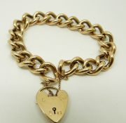 A 9ct gold curb link bracelet with heart padlock clasp, 57.