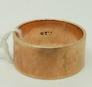 A yellow metal ring/ wedding band marked 14k, size S, 5.