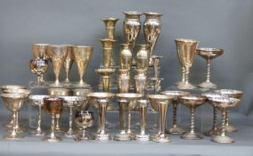 A quantity of silver plated goblets and vases including some sets,