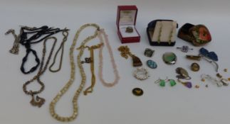 A collection of jewellery to include mother of pearl necklace, tiger's eye pendant, cameo ring,