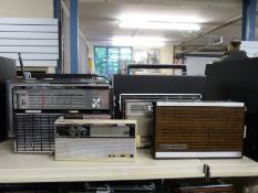 Six radios comprising a National Panasonic FM/AM six band 19 transistor model RF3000N together with