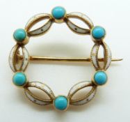 An Edwardian brooch set with white enamel and turquoise cabochons