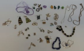 A collection of silver jewellery including necklaces, chains, pendants, silver earrings,