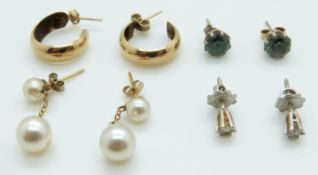 A pair of 18ct white gold earrings each set with diamond of approximately 0.