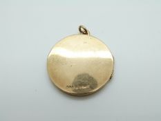 A 9ct gold locket, Chester, 16.