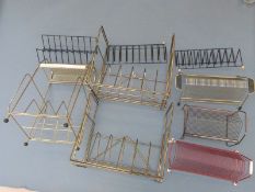 A collection of c1960s record or tape racks