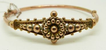 A Victorian bangle with sphere decoration, 7.
