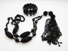 A Victorian jet necklace of faceted beads with tassel and similar bracelet