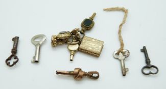 Two Victorian watch keys, two Victorian fobs one reading 