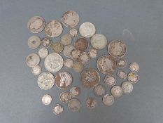 Approximately 215g of mixed silver coinage includes Victorian and other pre 1920 etc